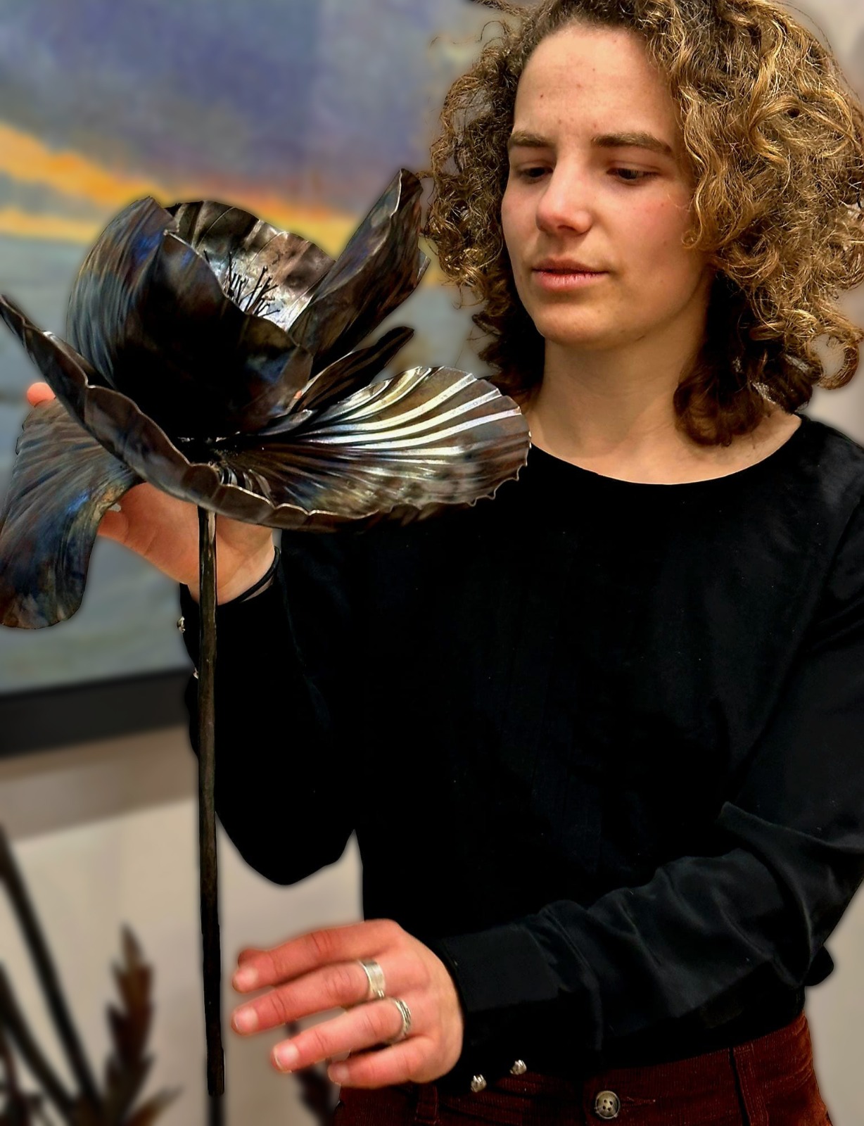 Rachel Climo at Galerie Bonnard with her metal sculpure flower art