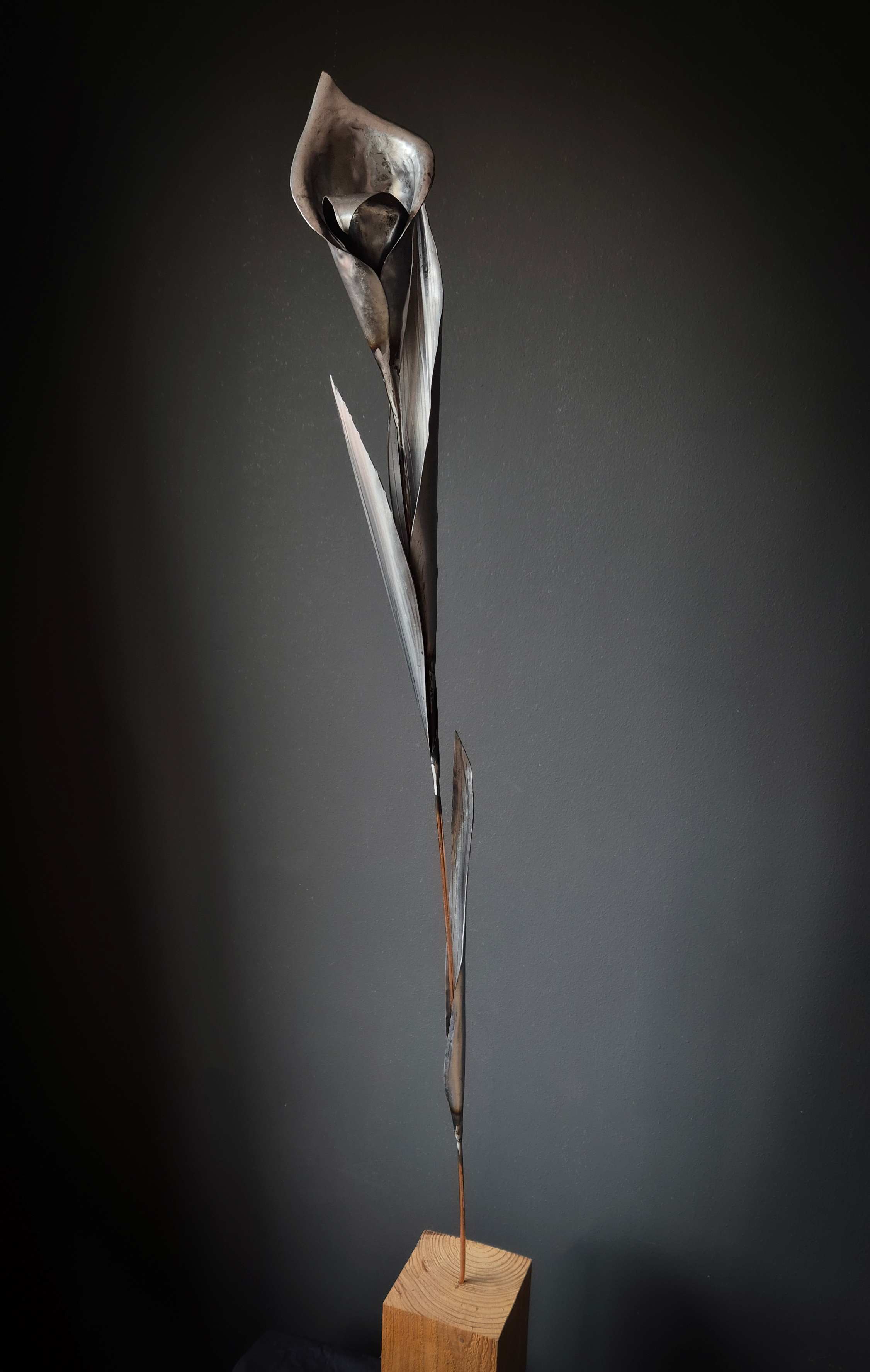 Metalartwork made by Rachel Climo lily, calla lily, yellow iris and gloriosa lily