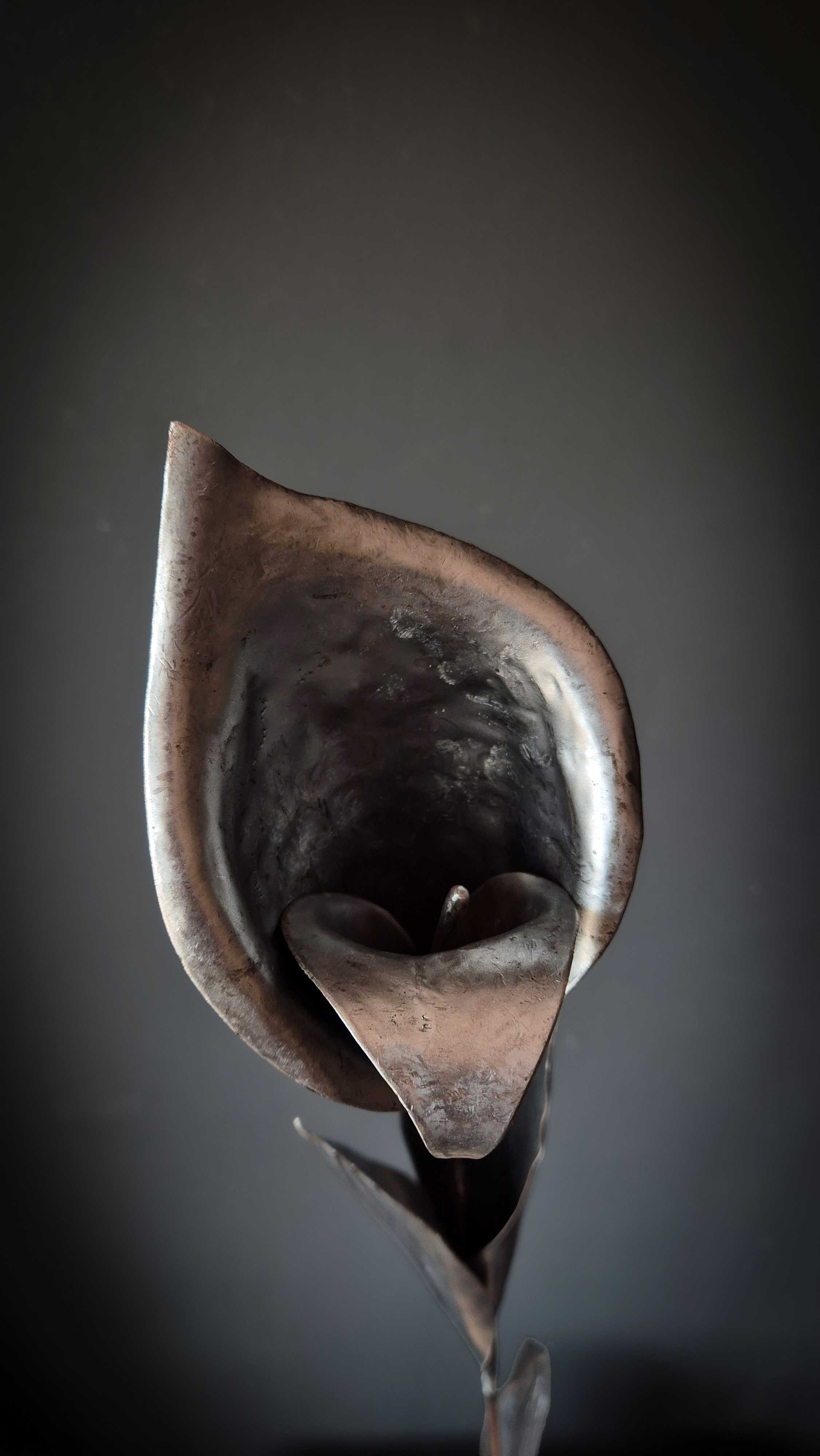 Metalartwork made by Rachel Climo lily, calla lily, yellow iris and gloriosa lily