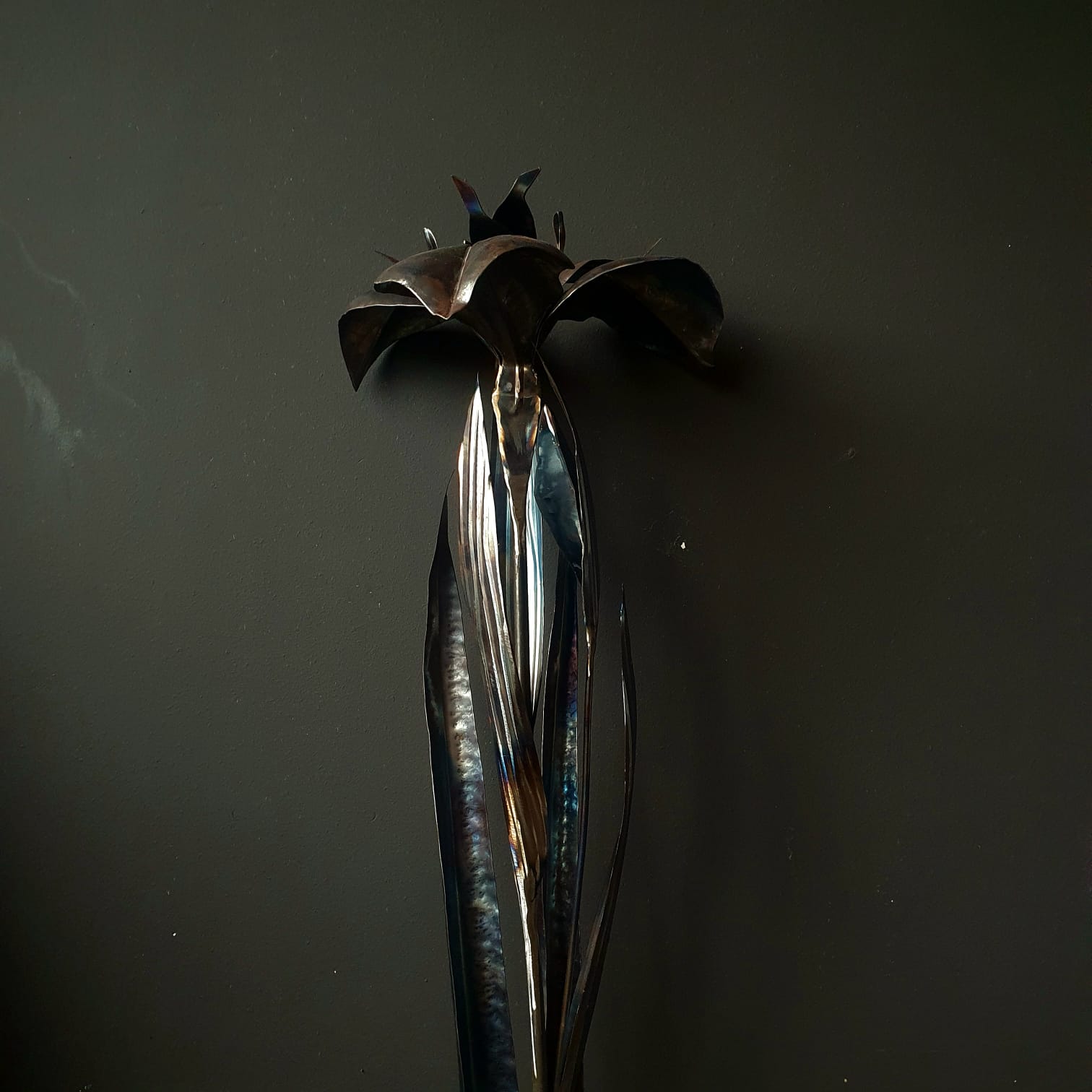 Metalartwork made by Rachel Climo lily, calla lily, yellow iris and gloriosa lily